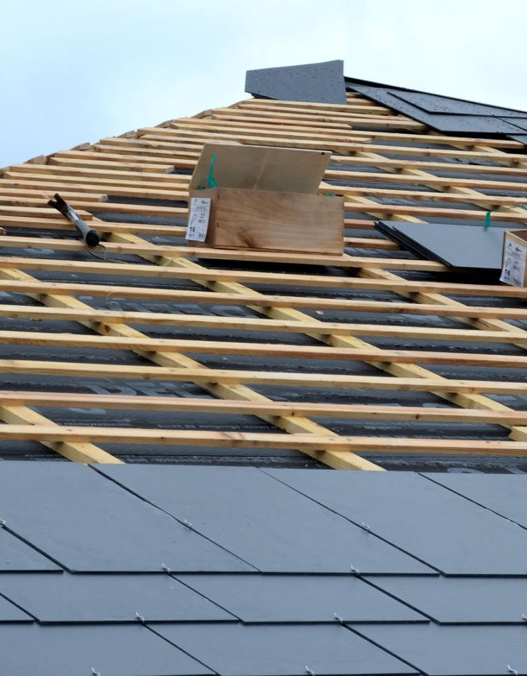 Pose et remplacement de tuile, ardoise et zinc à Asnières-sur-Seine - Entreprise Falck dans les Hauts-de-Seine et en Ile de France.